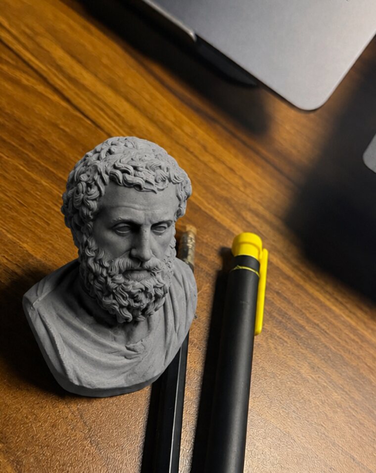 A miniature philosopher, sculpted from a kneadable eraser